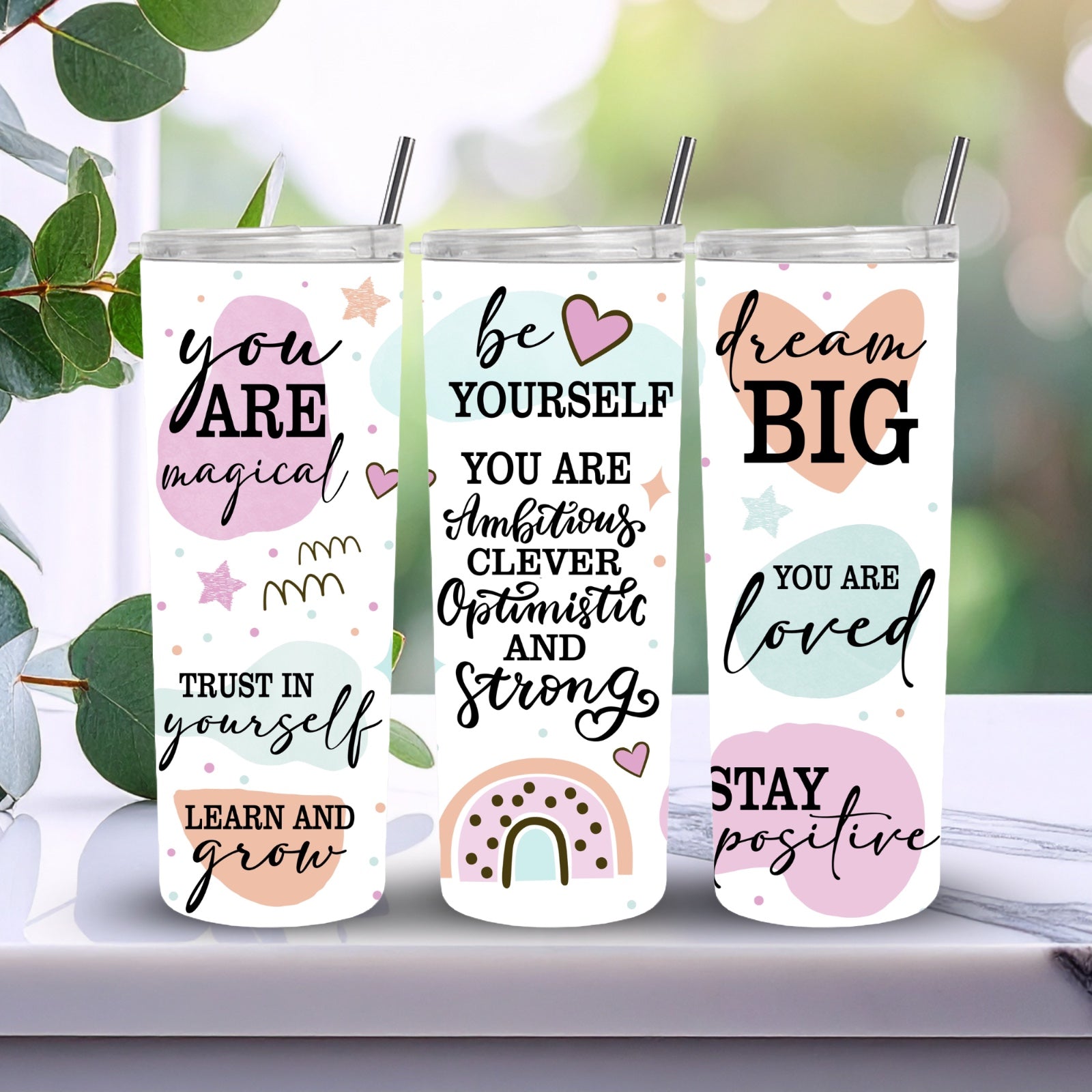 Tumbler 20 oz with positive words, featuring thermal insulation that keeps beverages hot and cold